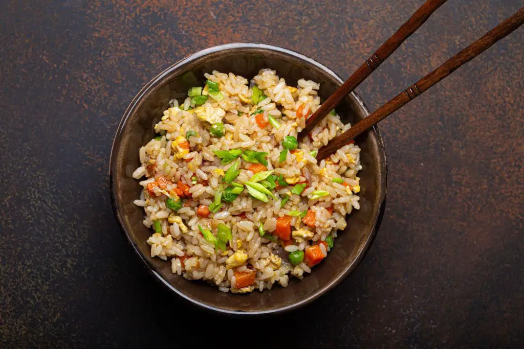 Is egg fried rice safe for dogs to eat